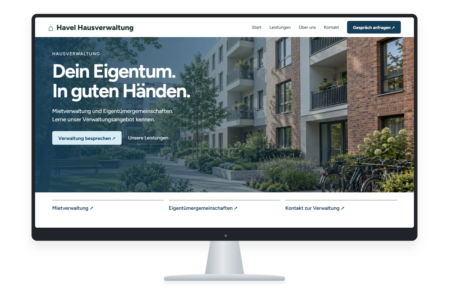 Fiktives Website Designbeispiel für Hausverwaltung auf einem Monitor