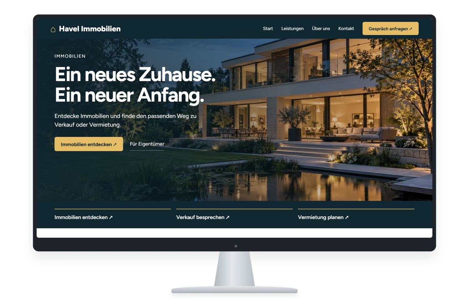 Fiktives Website Designbeispiel für Immobilien auf einem Monitor